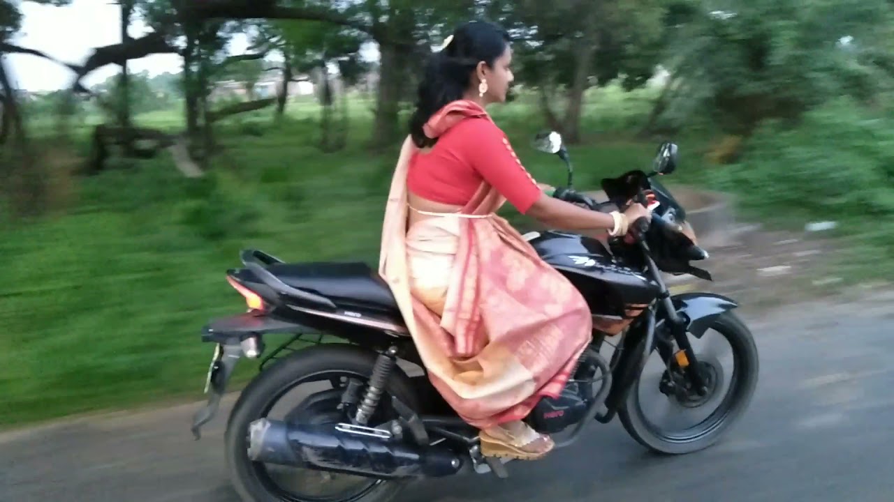 Bike riding wearing saree / Bike riding wearing Bengali style saree