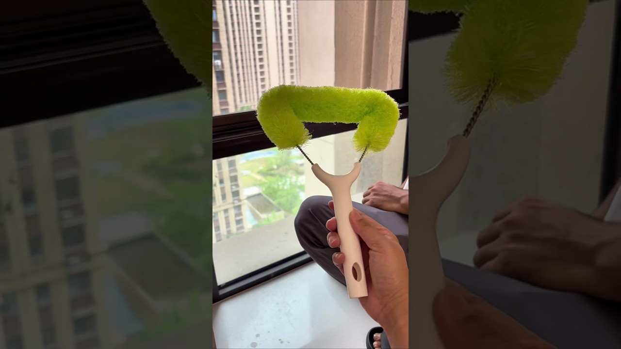 a microfiber duster, a cleaning tool designed to attract and trap dust and dirt particles. 