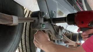 how to replace a suspension equalizer. triple axle trailer.