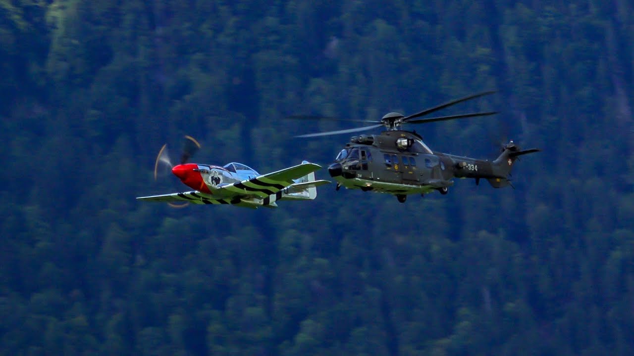 P-51 Mustang Formation Flight with Aérospatiale AS 332 Super Puma Helicopter
