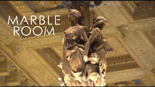 Marble room is a steak and raw bar located in the historic garfield
building. from lights to statuary, it's thing of beauty.