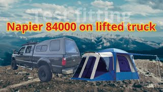 Napier 84000 suv tent on a lifted full size truck