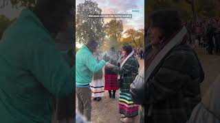 People gathered at sunrise in Minneapolis to honor Indigenous Peoples Day