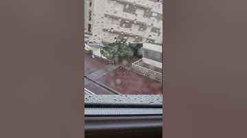 Quick heavy rain,wind and icing in Bastia