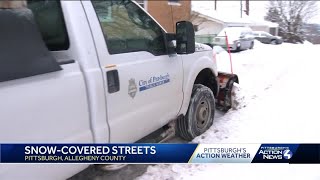 Pittsburgh road crews clearing snowy side streets