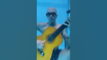 Practicing legato underwater 🎵🤿 #guitar #youtube #funny #funnyshorts