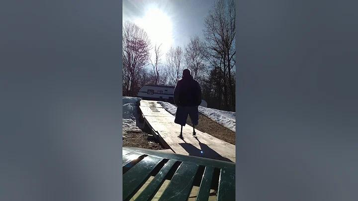 Bilateral AK Amputee walking up and down a steep ramp with no assistive devices