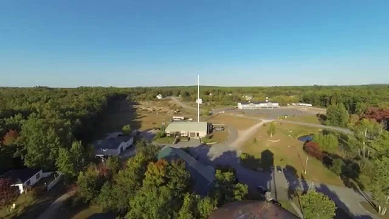Fremont NH.  A quick flight around the smokestack and watertower