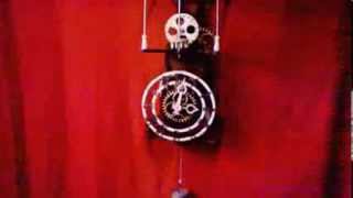 RELOJ CON ANTIGUO SISTEMA DE ESCAPE