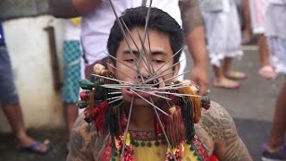 طقوس مؤلمة في عيد لاتباع الديانة الطاوية في تايلاند