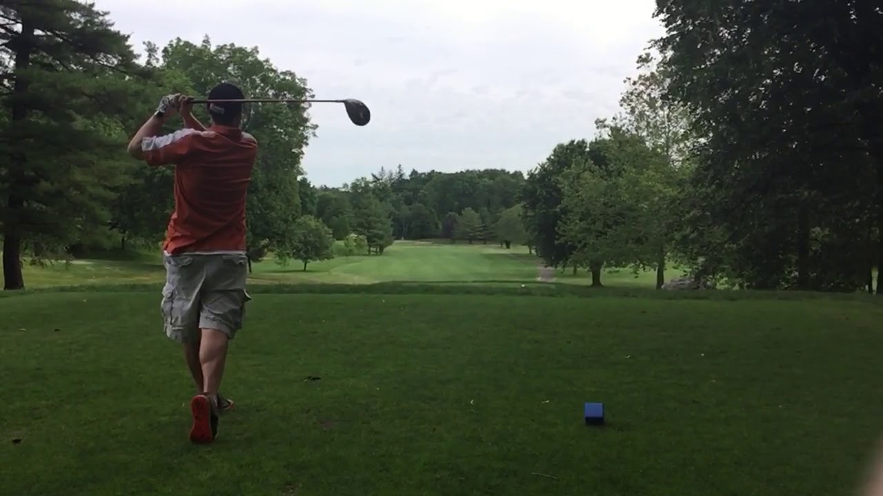 Jonathan driving a golf ball slow motion YouTube