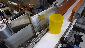 Labelling system for conic container