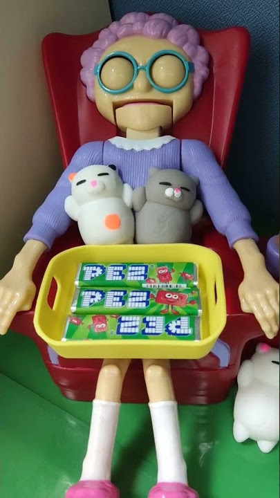 GREEDY GRANNY WITH HER CATS AND PEZ CANDY #pez #cat #cats