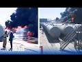 Oil tanks burn in Russia after suspected strike by Ukrainian drones