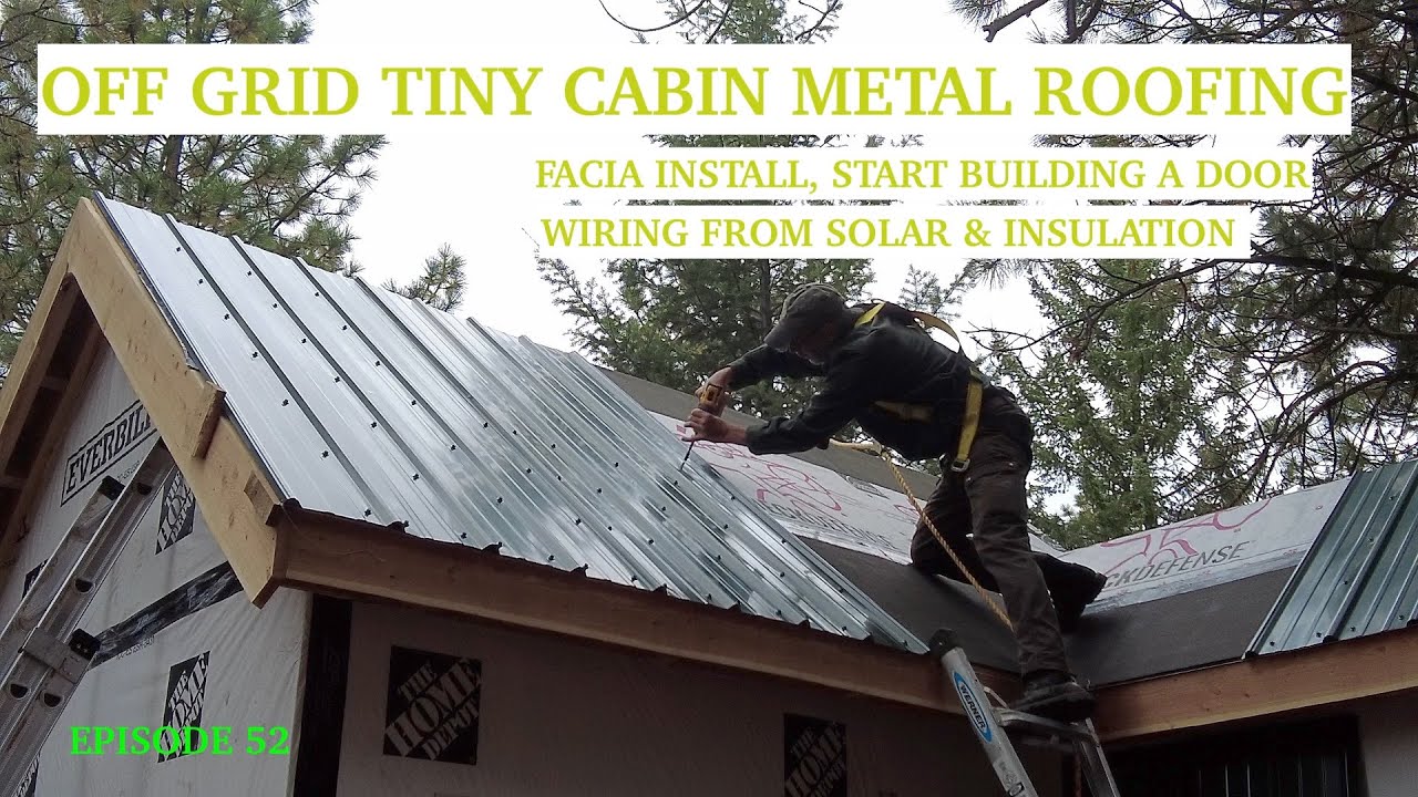 Installing the metal roofing on my Off Grid tiny cabin & starting the ...