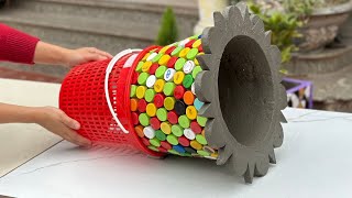 Advantage of Plastic Bottle Caps Old And Cement Into Beautiful And Unique Plant Pots