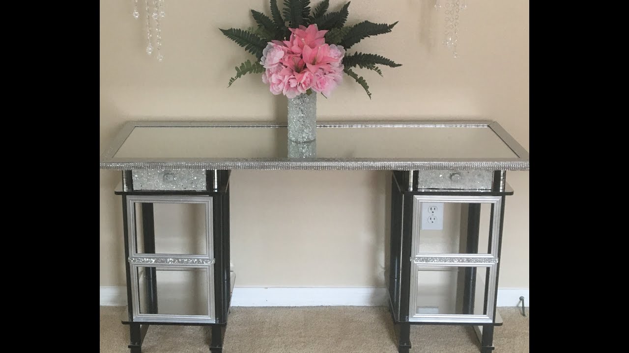 DIY Console Table using mirror contact paper, two high end tables, and a  door mirror. 