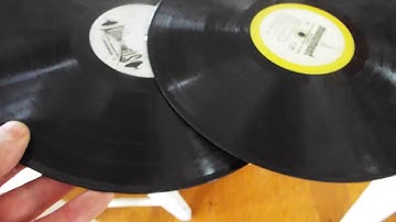 Motorola 4 speed automatic record player playing a 33.3 RPM LP records