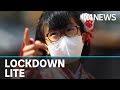 Japan is gambling on a 'lockdown lite' strategy to beat ...