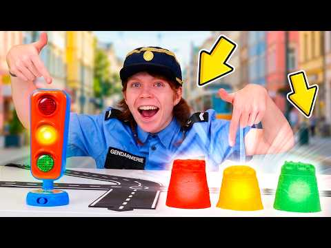 Le gendarme des jouets et le feu tricolore en sable. Jeux pour les enfants