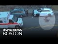 Massachusetts officer dragged by suspect's car expected to be OK, family says