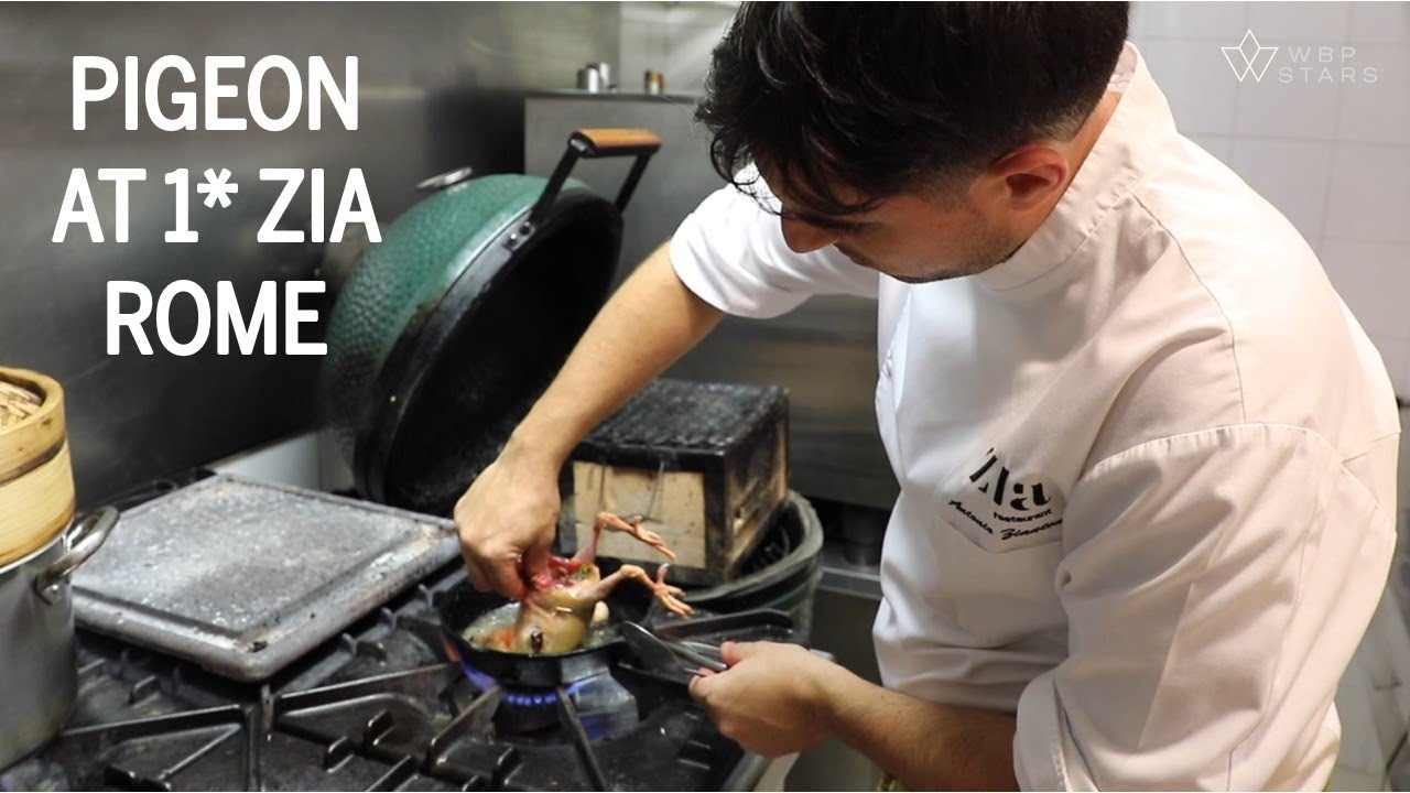 Chef Antonio Ziantoni prepares a delicious pigeon at the 1-star Michelin restaurant ZIA in Rome, Italy.