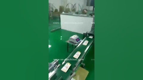 Automatic premade bag packing line with weight checking machine robot hand palletizing line