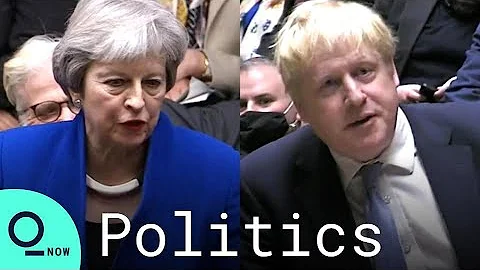 Former U.K. PM Theresa May Slams Boris Johnson Ove...