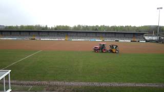 Sports Pitch Maintenance Applying Sand Top Dressing to a Football Pitch.