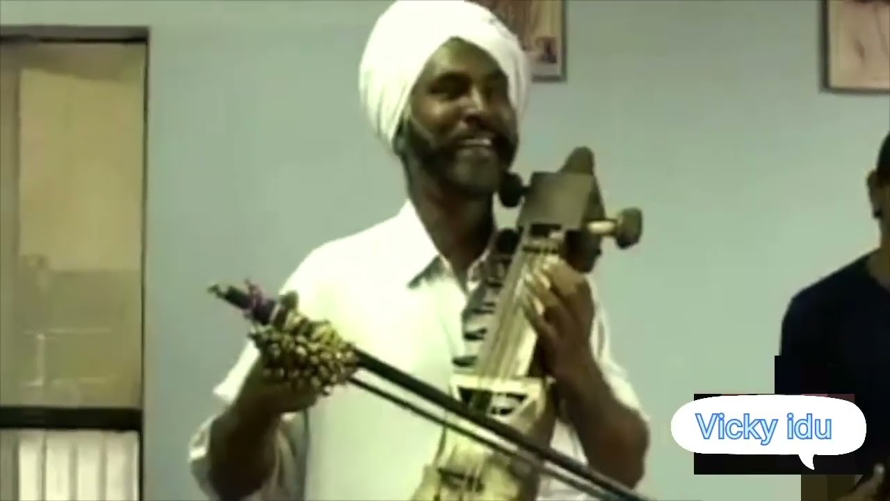  Sharif idu with son vicky idu Eh awaz nahi,ik poora daur(era)hai.sukoon dard di rooh di khurak.