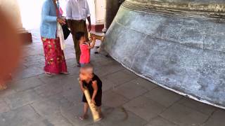 1411 Little girl, big bell in Myanmar