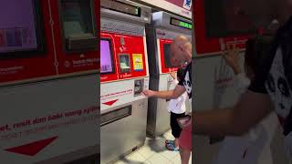Buying Tickets in Kuala Lumpur, Malaysia /Ticket Vending Machine #travelshorts #ytshorts #shortsfeed