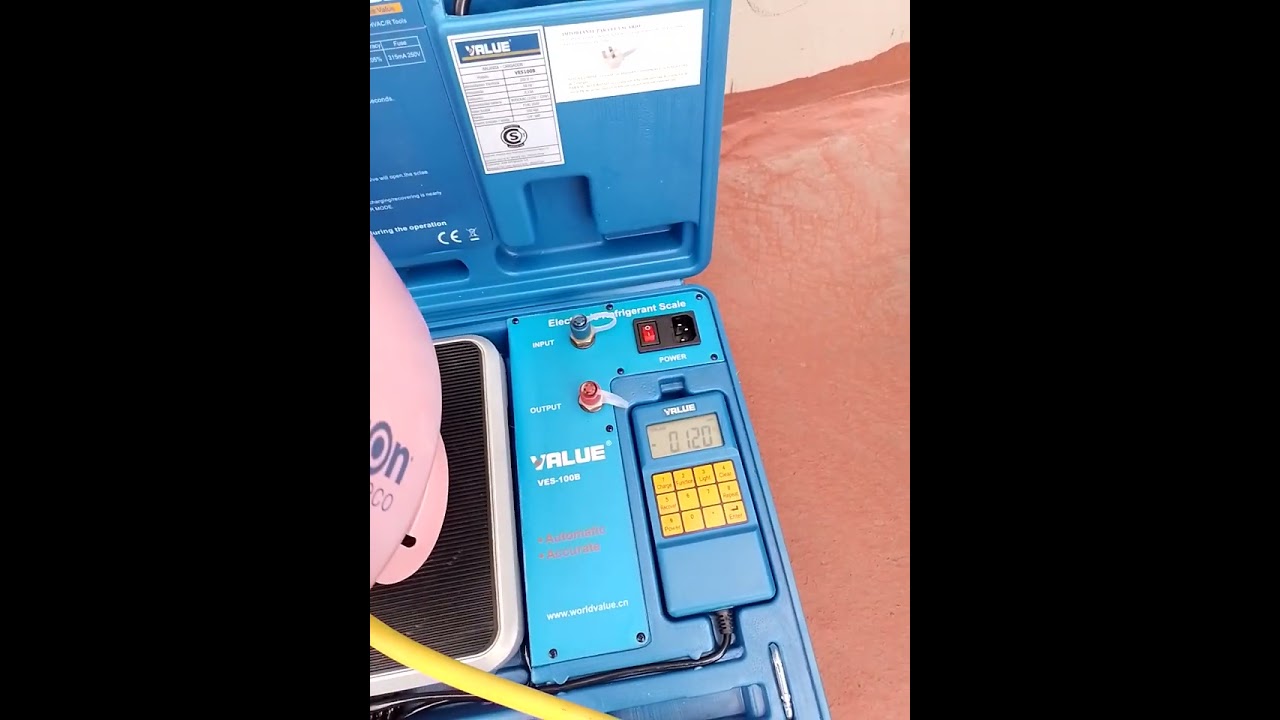 carga de gas refrigerante r 410 con balanza