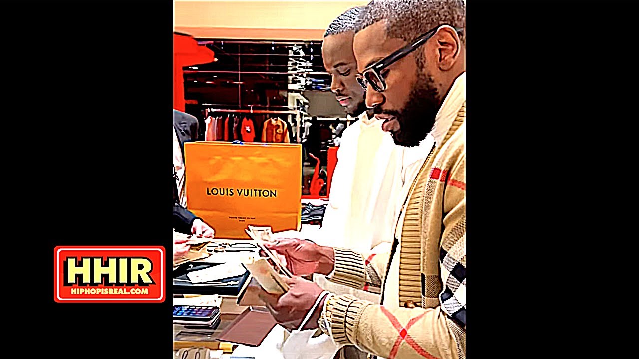 FLOYD MAYWEATHER COUNTING CASH SHOPPING AT LOUIS VUITTON!!! 