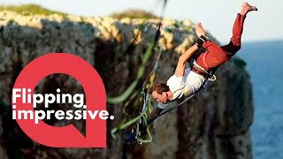These are the mind blowing stunts performed by a daredevil acrobat on a suspended high wire | SWNS