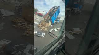 Truck Dumping Garbage