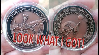 I got a piece of a Mars Rover!