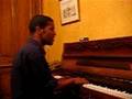 Jrocker singing redemption song bob marley on the piano