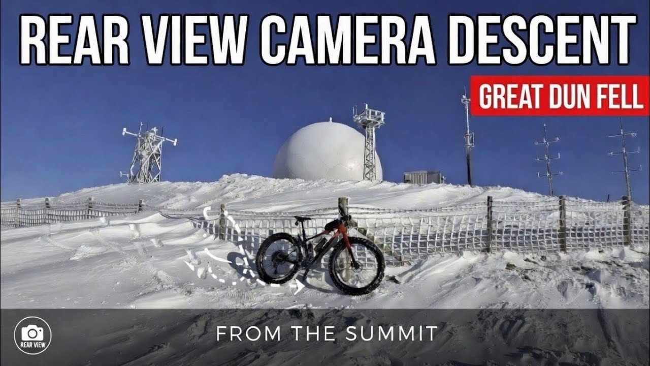 Rear view cycling descent down Great Dun Fell through snow and ice - NATS air traffic control