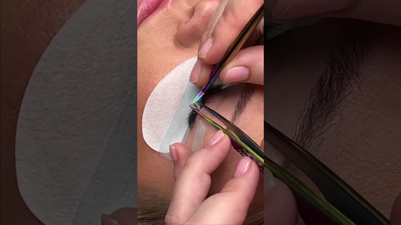 Close-up shot of a premade fan being applied to natural lash! 