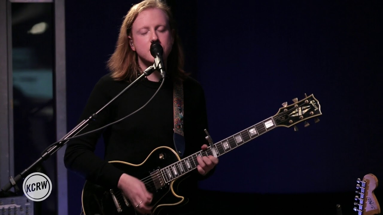 Two Door Cinema Club performing \