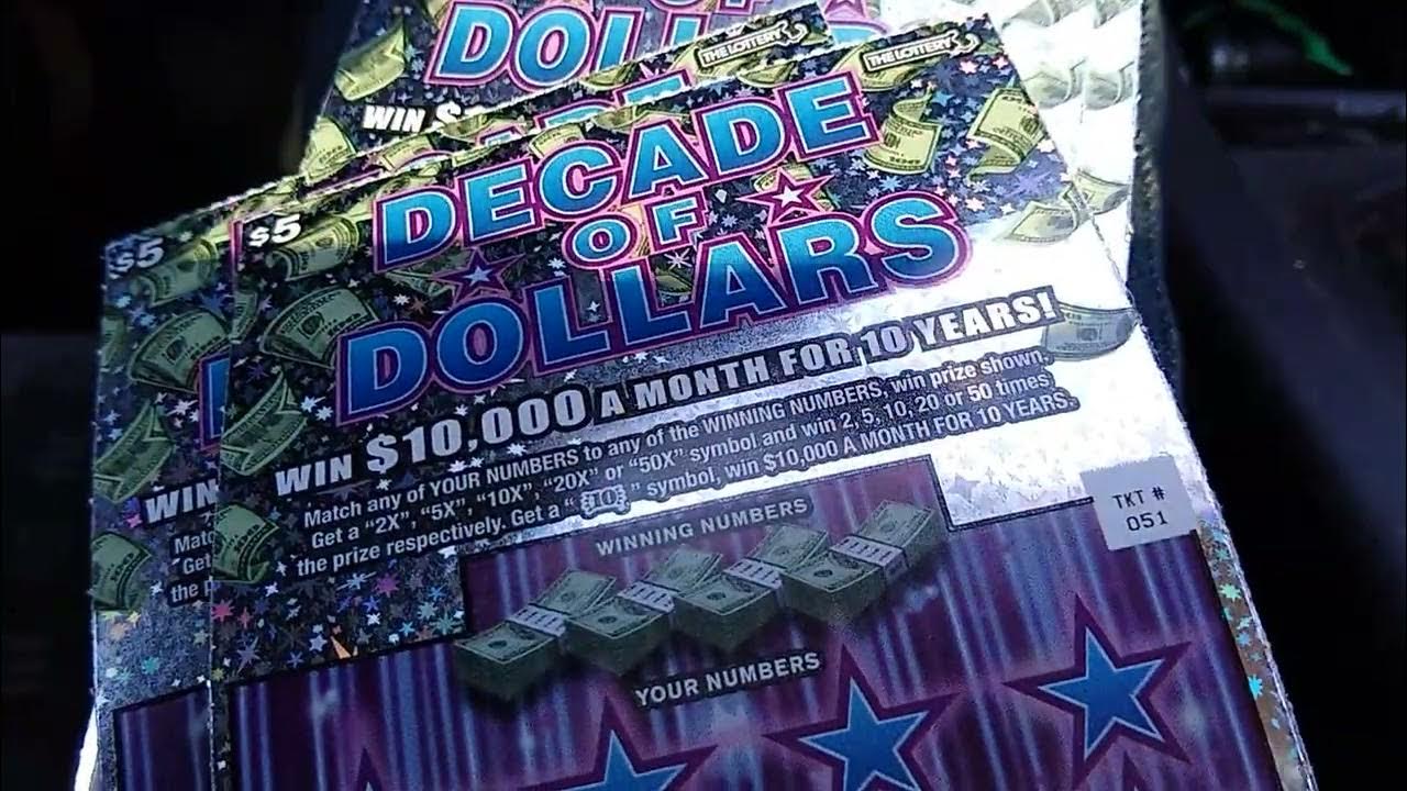 6 scratch off lottery tickets. Decade of dollars. 