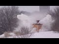 Watch snow drifts explode as train crashes through using old Illinois Central wedge plow