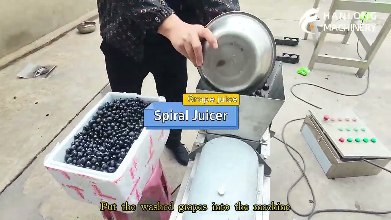 How does a screw press extract grape juice?