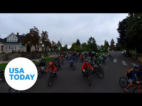 "Bike bus" takes over the streets of Portland | USA TODAY