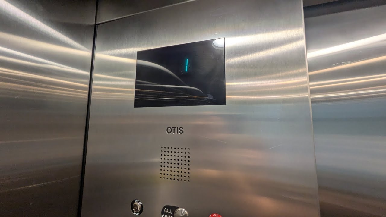 Scenic Otis Series 4 Hydraulic Elevators Riverfront Garage 