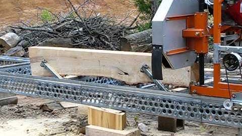 Norwood LM Mark-4 sawmill w/power feed sawing sassafras
