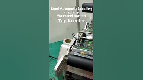 Semi automatic labelling machine for round bottles