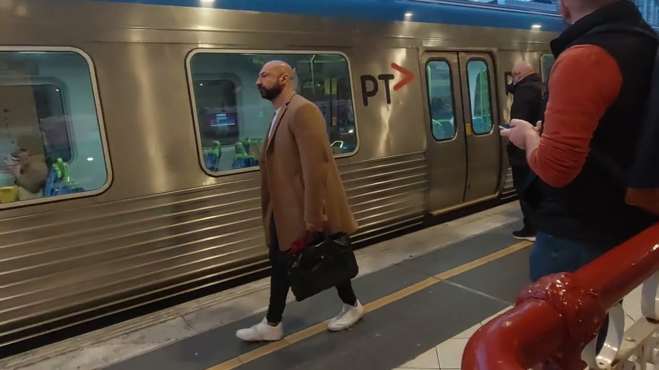 Trains from platform 5 and 6, Flinders street station, last day of Autumn. Melbourne.