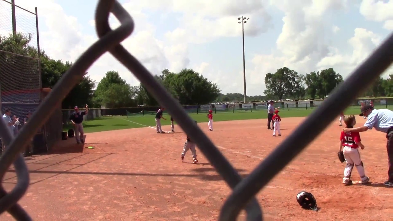 Adrian Vick 5 year old slugger hits a triple.  Youth Baseball